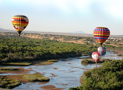 Ballons touching down in the Rio Grande